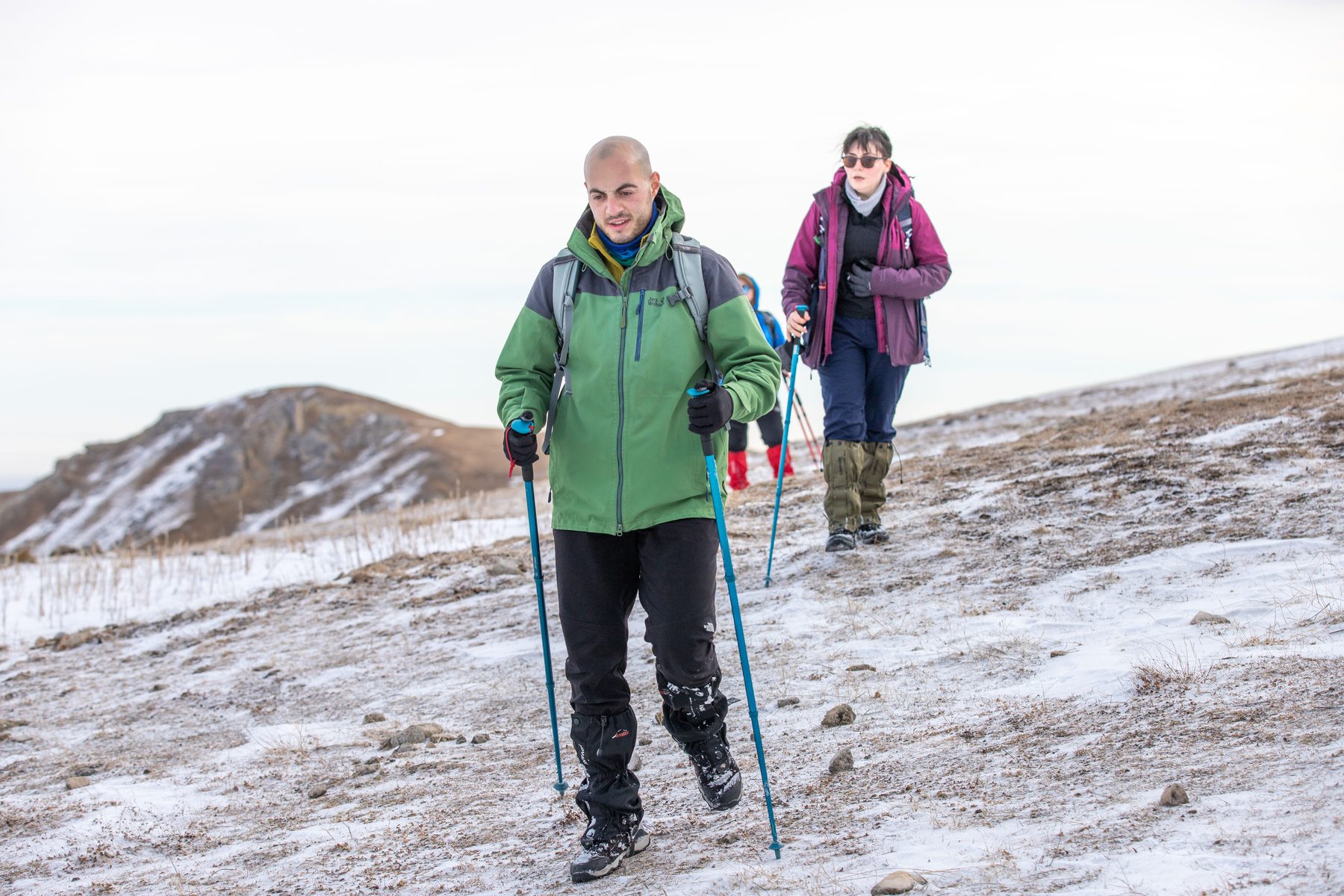 Two trekkers crossing a snowfield high on Kilimanjaro